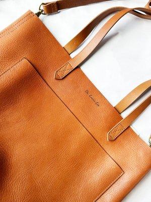 Custom engraved leather tote bag with the graduate's name--perfect gift for a new doctor to celebrate their achievement!