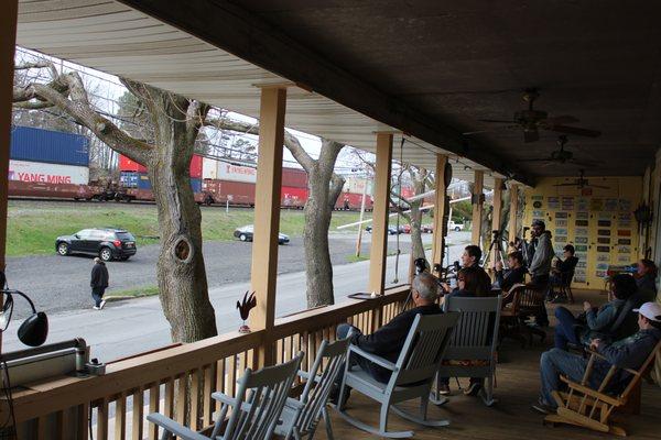 Train-watching on the front porch.