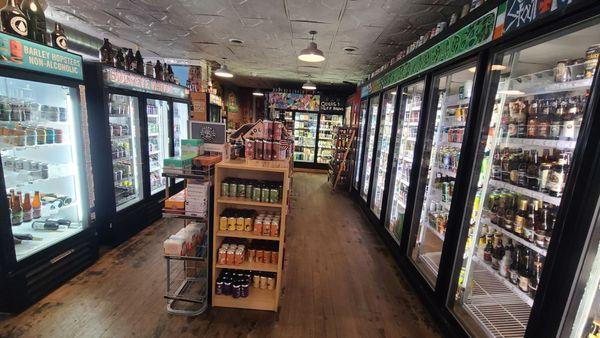 Most of these coolers are filled with beers you buy by the single.