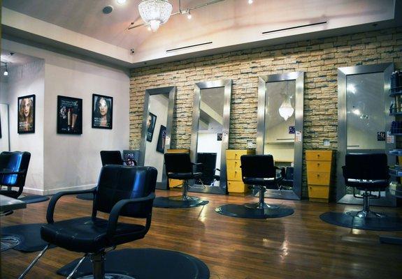 The chic, clean styling area and salon chairs at Breeze Salon and Day Spa, Georgetown's premier Aveda salon and spa.