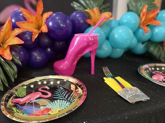 Hot pink tumbler heels sets the scene in a hot tropical dream theme for girls' night out the me party décor.