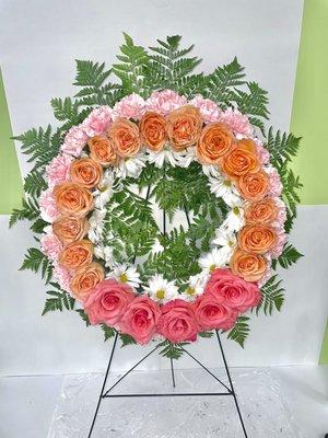 Another floral adornment made with all natural flowers. We are able to replicate this or add different colors.