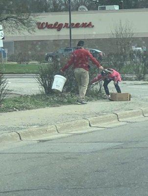 China Star has kids outside with food tongs picking up trash