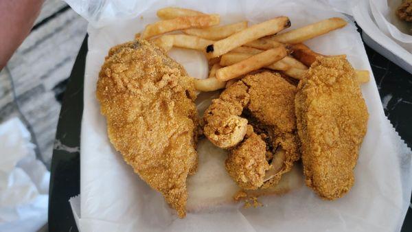 What the hell is that horseshoe piece doing in a Catfish steak dinner???