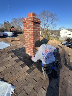 Working on the chimney 
and new roof installation