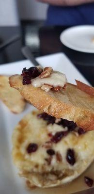 Baked bree with cranberries  and walnuts