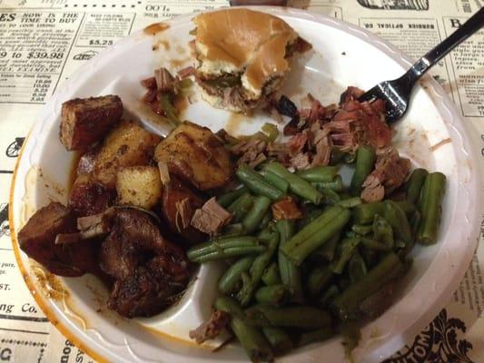 Quickly eating my brisket sammie and two sides w a drink $7. Quality spicey bbq sauce.