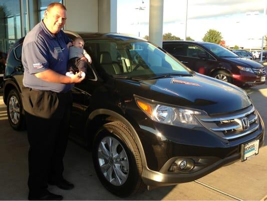 Our new car is all about our little boy, so we made our sales associate, Jack Mosley, pose with him for a photo :) Thanks, Jack!