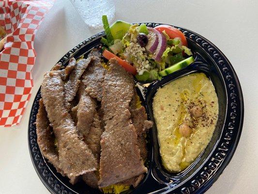 gyro platter with jalapeno hummus and a dash of olive oil