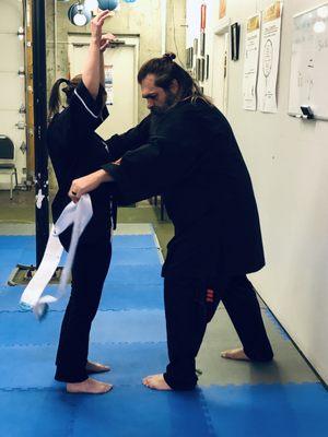 There are two times your Sifu will tie on your sash: the first one, the White, and finally when you have earned it, your Black.