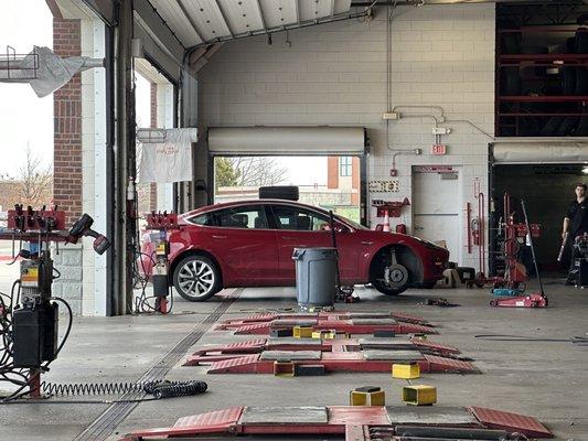 Repairing a tire for a Tesla Model 3