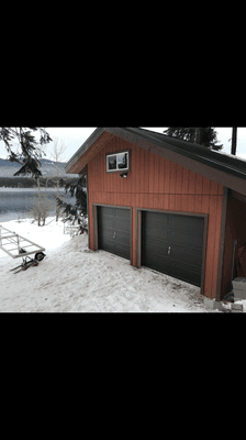 Garage doors with outside keyed locks.