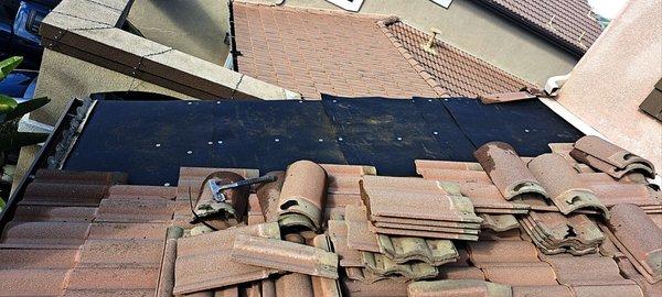 Damaged roof repaired by Weathertight Roofing Company Inc.Hemet,California