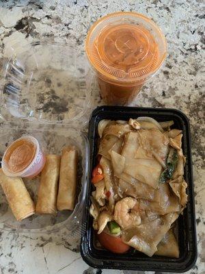 Chicken and shrimp drunken noodles, spring rolls and thai tea for $30