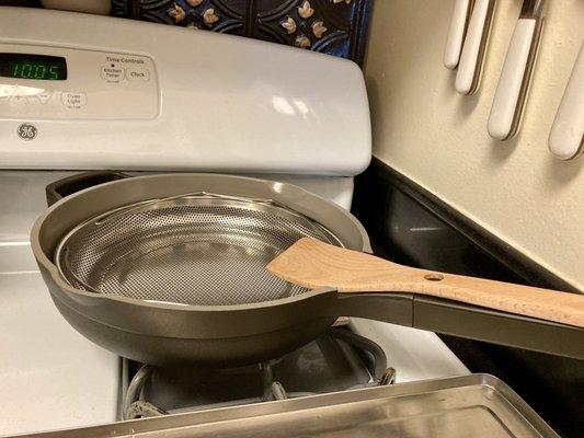 The pan with steamer basket and spatula. Posted with review 03/26/23