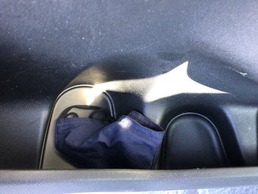 Used Cloth Face Covering in Driver's door