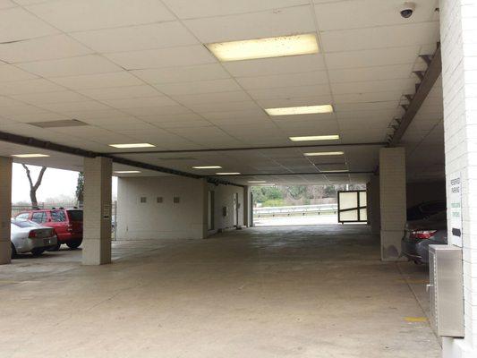 Parking garage.  Be sure and enter the front door.  I took the stairs on the right, but that door was locked.