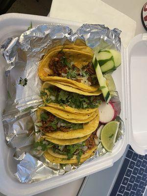 Chorizo tacos and Al Pastor tacos