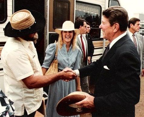 Manny Gammage and daughter Phyllis L. Gammage Presenting Ronald Reagan with Custom Hat.