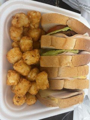 Club sandwich with a ton of tato-tots