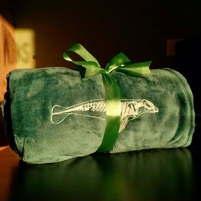 Custom gift: blanket with embroidered manatee skeleton