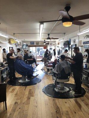 Every time I come, this place is packed. Bunch of great barbers.