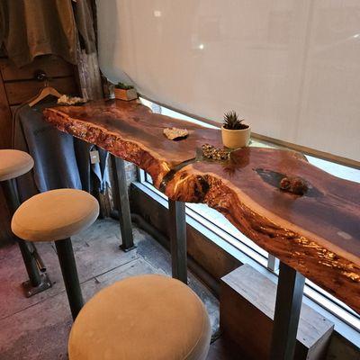 The "bar" with crystals embedded in the acacia wood!