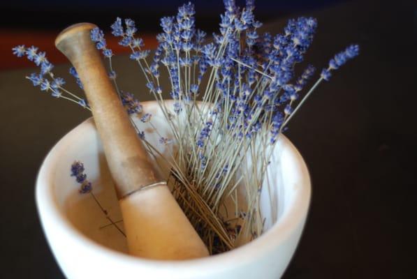 Grinding fresh dried Lavender from our botanical garden