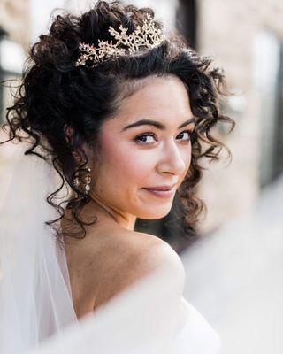 Curly hair bridal styles are a Deluxe specialty.