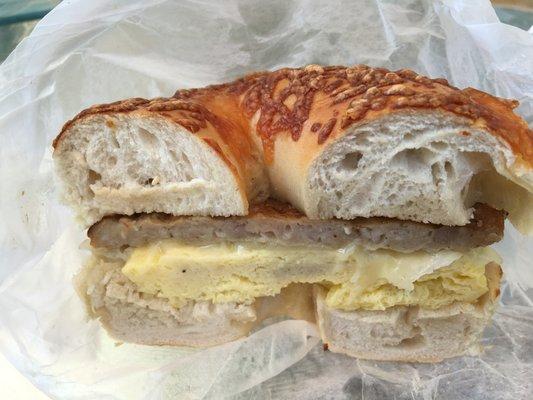 Sausage, egg and cheese on an Asiago Bagel