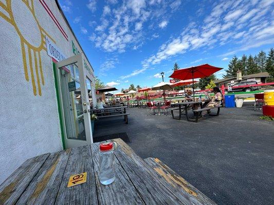 The picnic tables on asphalt