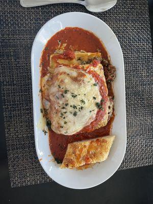 Meat Lasagna with garlic bread. I'm not sure what kind of bread it was, it was slimy and cold, I didn't care for it