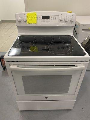 GE White glass top stove