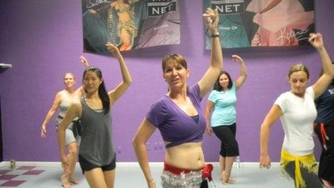 Dilara leads a beginner belly dance class in the Beaumont studio