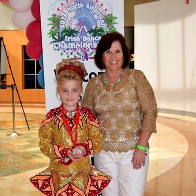 Mrs. Kerry Kelly Oster with 8yr old champion dancer at the North American Irish Dance Championships.