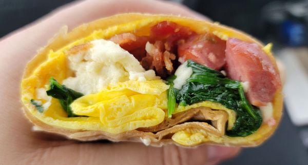 Build your own breakfast burrito (eggs, bacon, spinach, queso fresco, and sausage that was more like kielbasa)