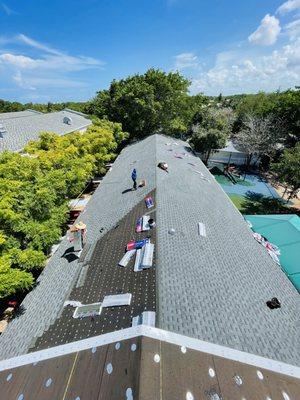 A shingle roof "in-progress" got to love our hard workers!