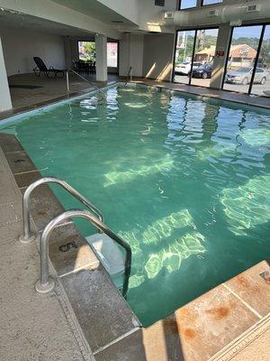 The pool-ceiling falling down...and if you zoom in you can see the line of algae around the inside of the pool because of the green water