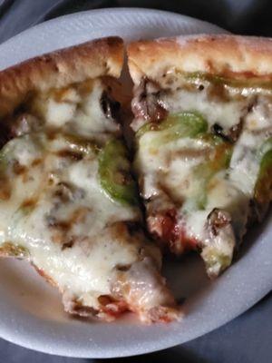 Beef, green peppers,  onions,  mushrooms and rich and chewy crust! Love it!