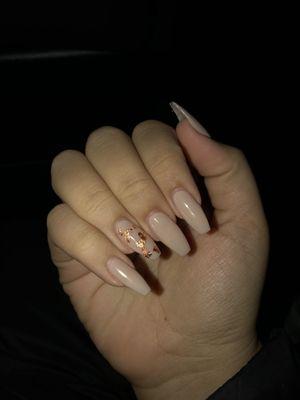 Light pink with rose gold foils nails.