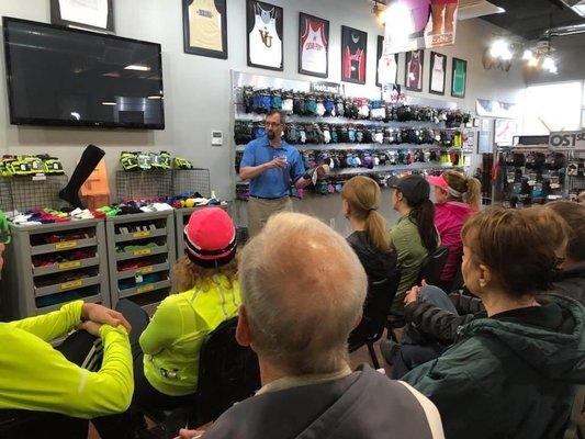 Dr. Sommer speaking to runners and other athletes at Extra Mile in Valparaiso on proper shoe fit and foot  injuries.