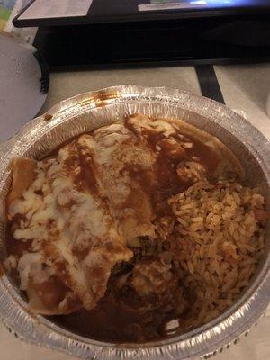 Two ground beef enchiladas one cheese enchilada rice and beans it was delicious.