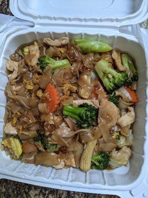 52. Pad See You (w Doubled vegetables Pan fried wide rice noodles w broccoli, egg, soy sauce, choice of beef, pork, chicken. Here chicken.