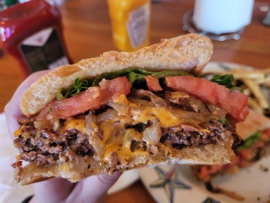 Juicy cheeseburger with fried onions