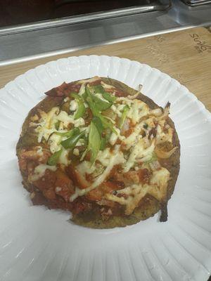 Veggies pizza in cocnut base .. in a tandoori grilled naan bread