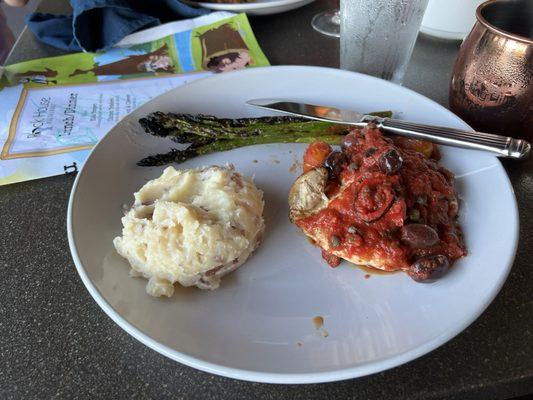 Chicken cacciatore. The asparagus are a little burnt, the mashed potato is actually tasty and chicken is okay.