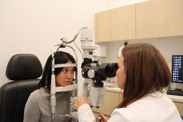 Doctor using Eye machine