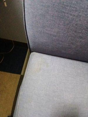 Condition of chair seat staned and smelled