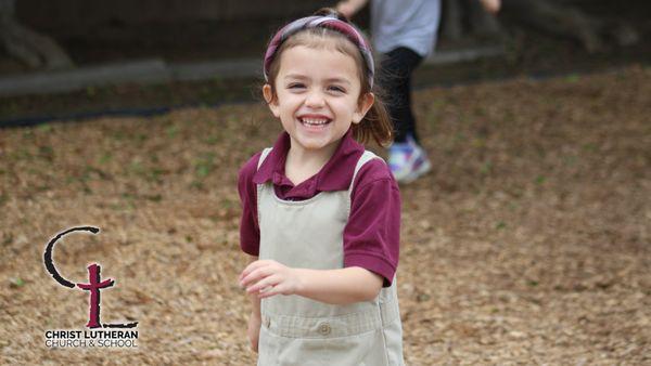 Student enjoying playground area.