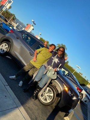 Happy family buying their brand new 2020 Nissan Kicks!